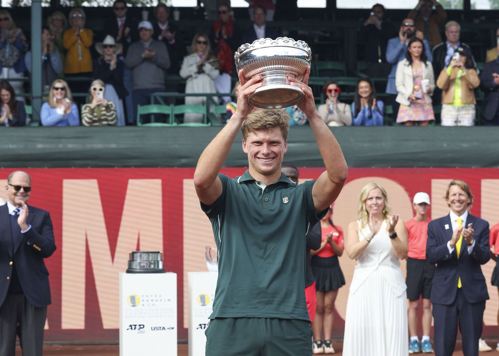 Jenson Brooksby poses with the Houston Open title | Image Source: Getty